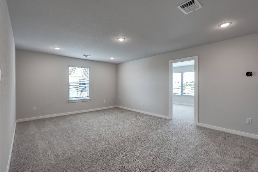 A room with a door and windows.