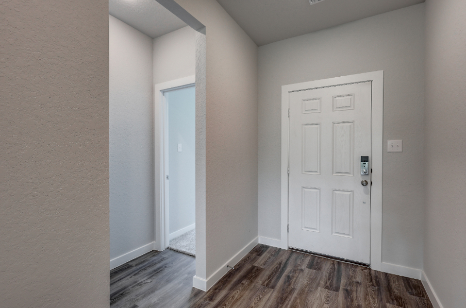 A room with white doors.