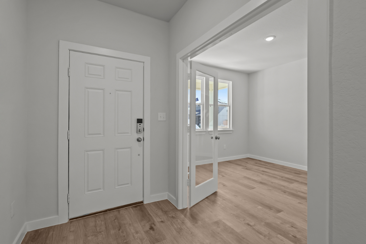 A room with white doors.