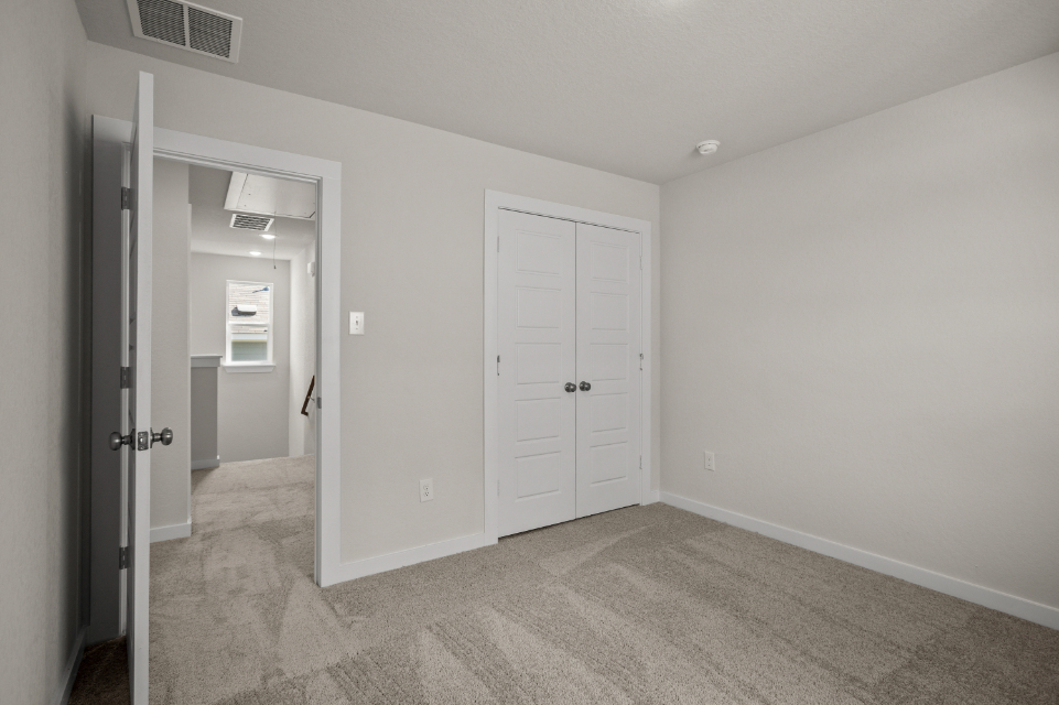 A room with white doors.