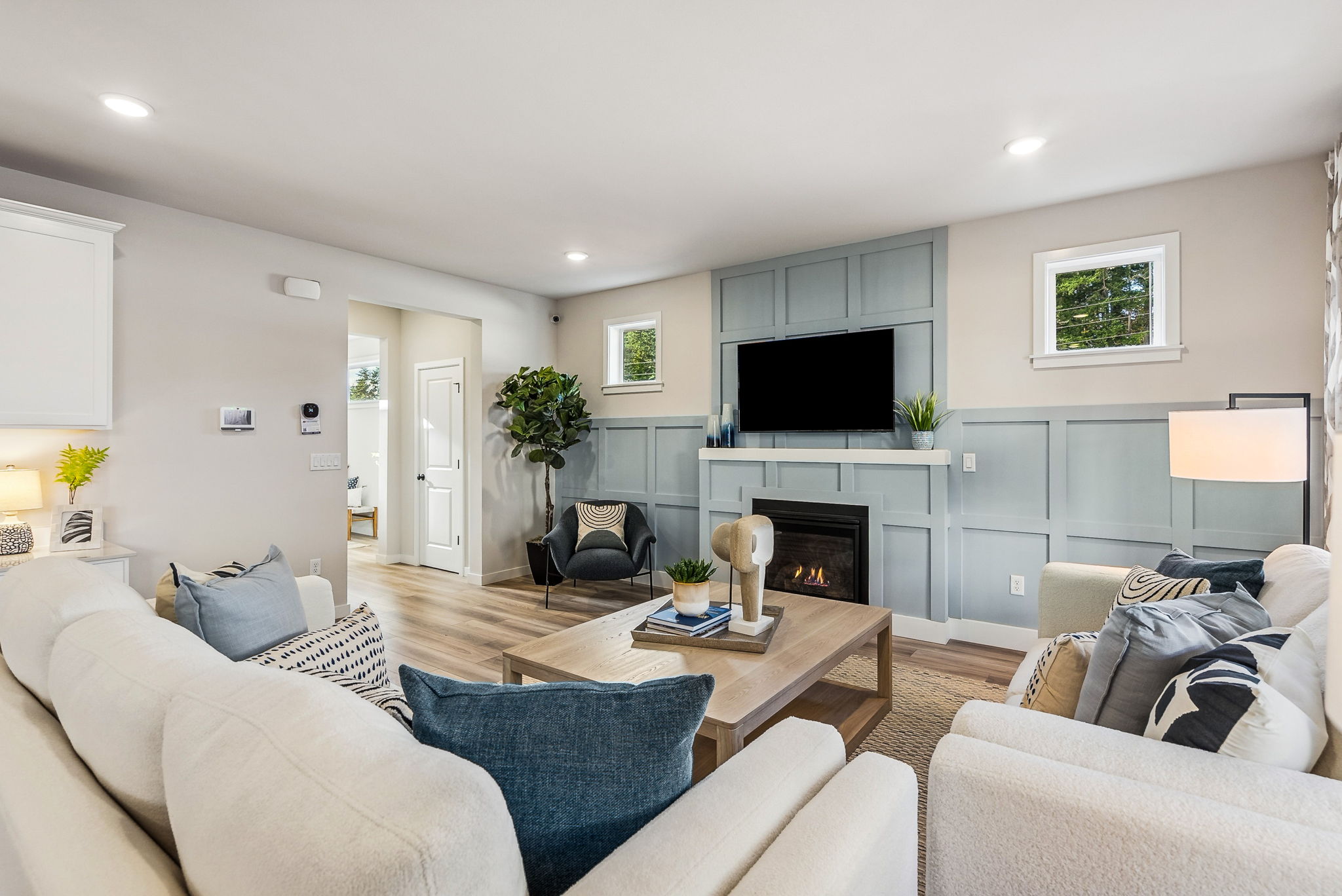 A living room with a fireplace.