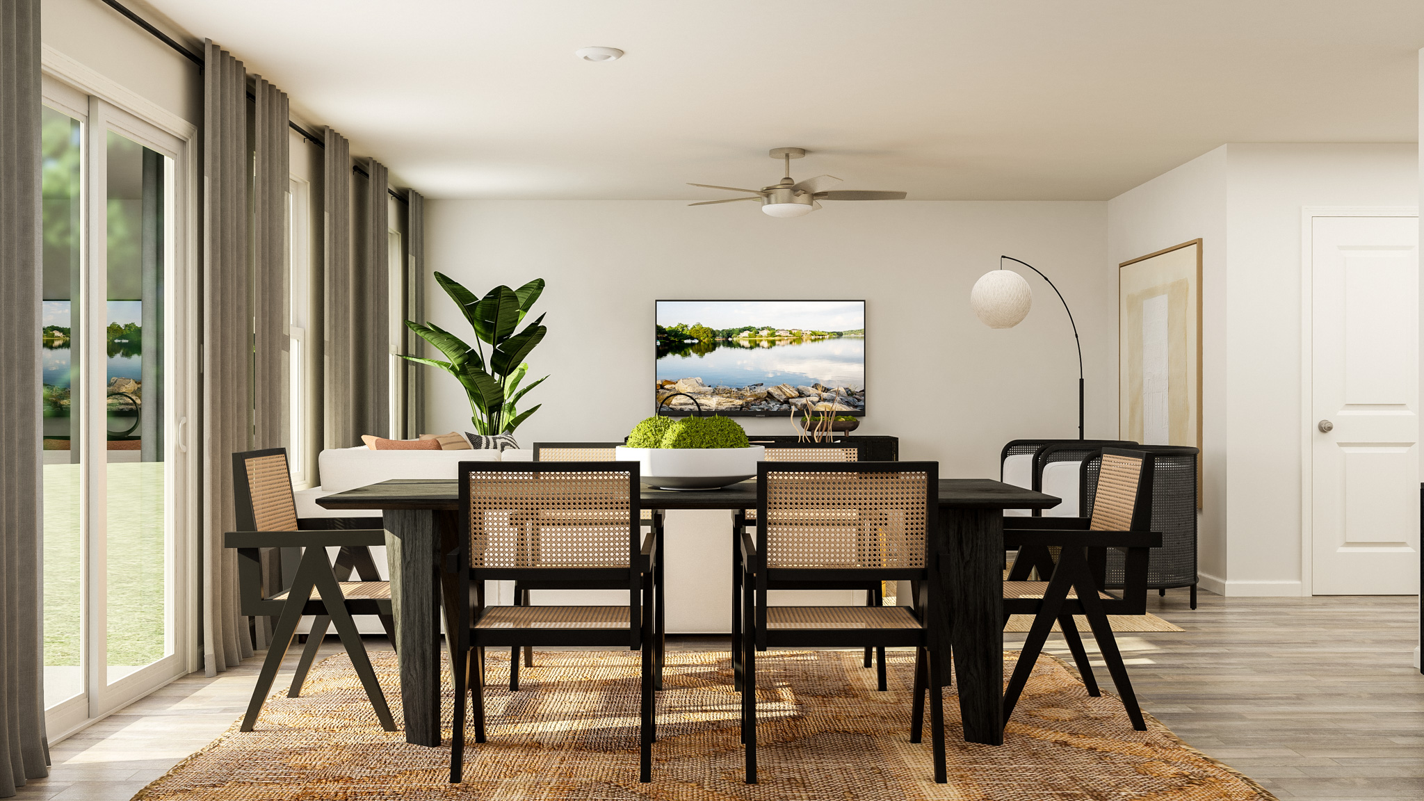 A dining room table with chairs.