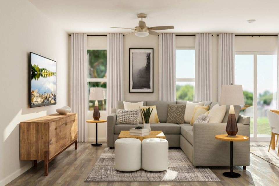 A living room with a couch and a table.