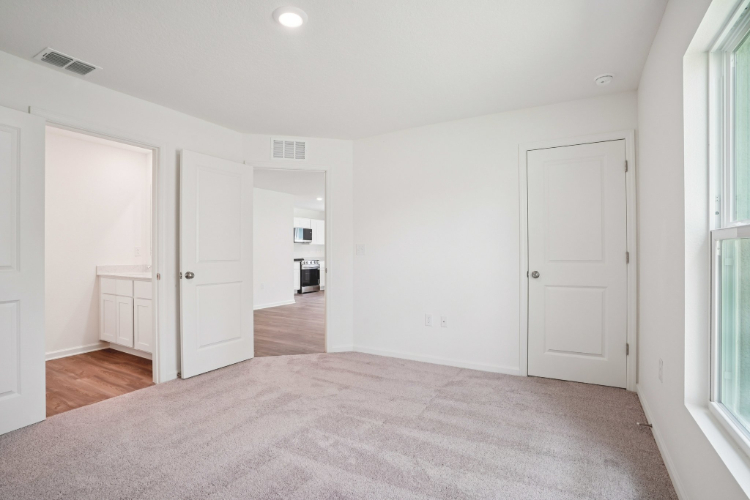 A room with white doors.