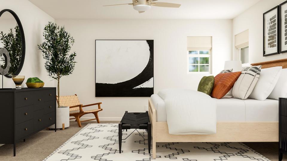 A living room with a couch and a table.