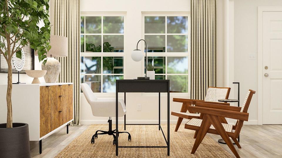 A room with a table chairs and a chair.