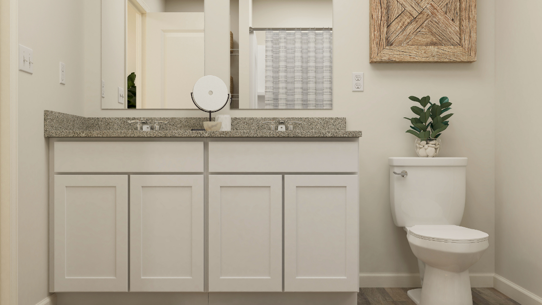 A bathroom with a sink and a toilet.